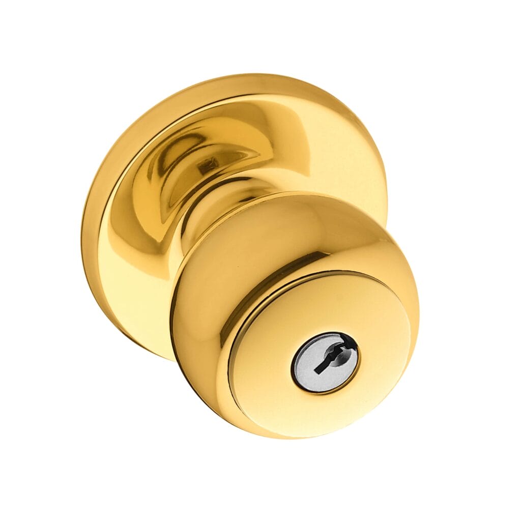 A polished brass keyed entry doorknob shown against a plain white background.